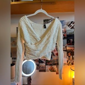 Cross sweater